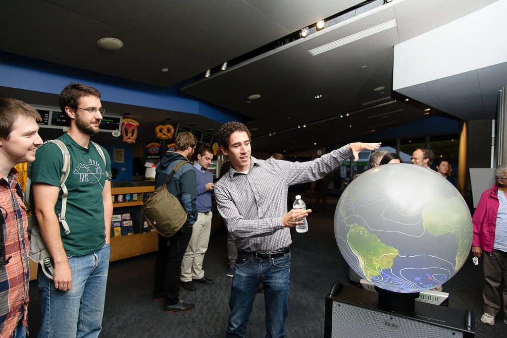 Graduate student Vince Agard demonstrating the iGlobe. Credit: John Gillooly