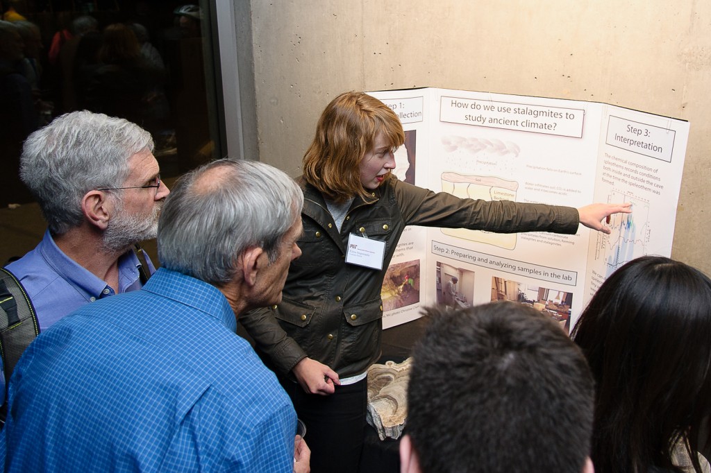 Graduate student Elena Steponaitis describes how her lab studies paleo-climate from minerals. Credit: John Gillooly