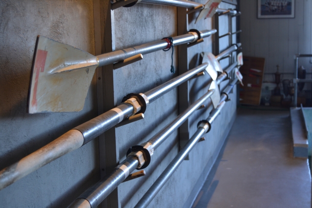 At the Harold W. Pierce Boathouse, white oars with red T — the emblem of the Engineers — hang on the wall. During the regatta, alumni and parents fill the boathouse with an abundance of baked goods and team spirit. “Sports are such an important part of student life. It keeps them balanced,” says Pam Gannon ’84. (Photo: Sam Hunter Magee/Arts at MIT)