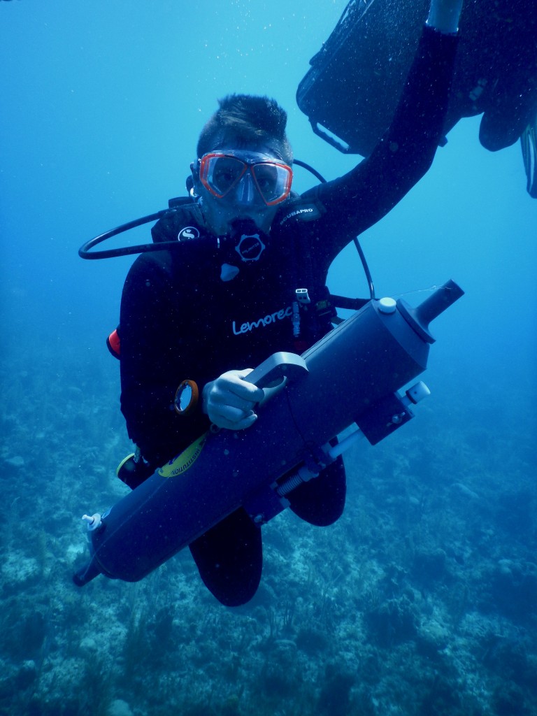 Andrew Babbin dives with a Niskin bottle for sampling. (Photo: courtesy of Andrew Babbin)